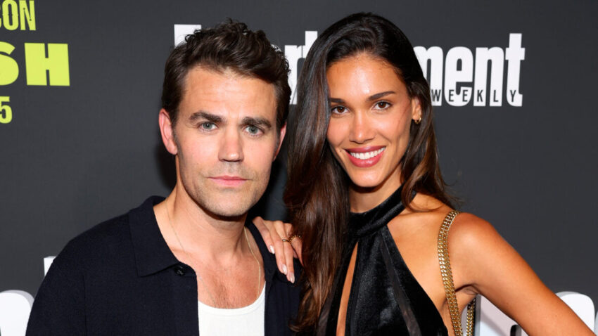Paul Wesley and Natalie Kuckenburg pose at Entertainment Weekly